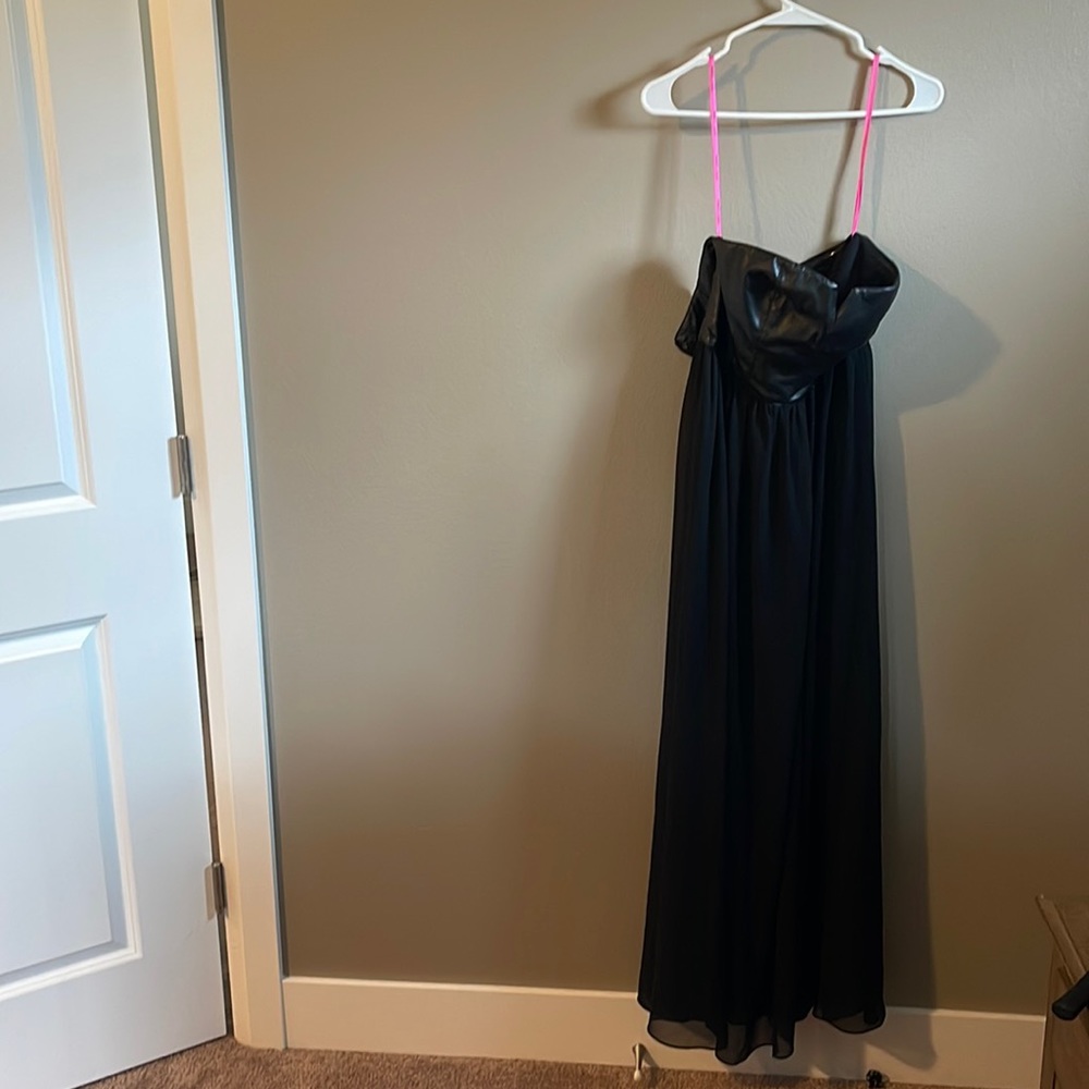 leather corset strapless top with chiffon bottom. Solid skirt under chiffon.